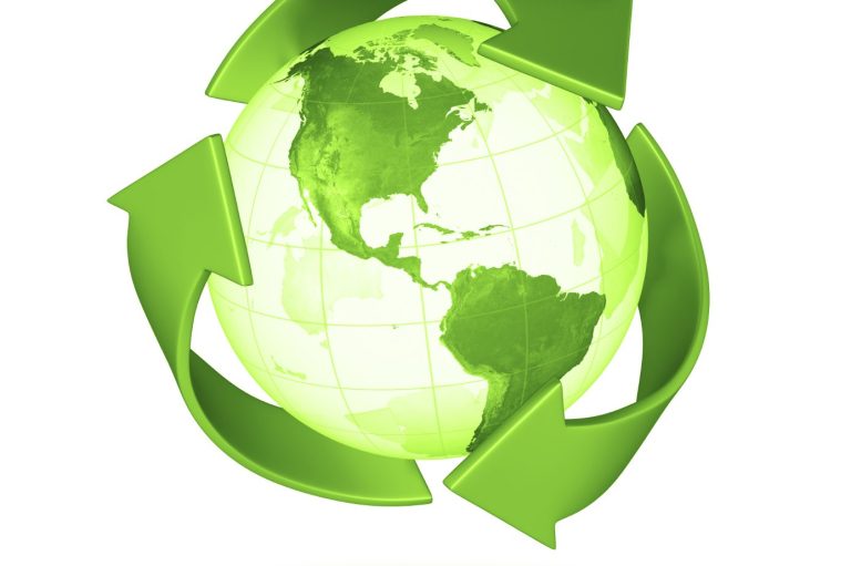 Globe with green recycling arrows symbolizing sustainability and environmental awareness.